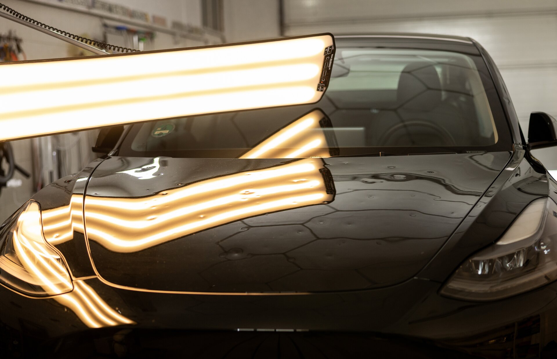 Denver hail-damaged car restored to factory finish by Dentic Denver paintless dent repair specialists