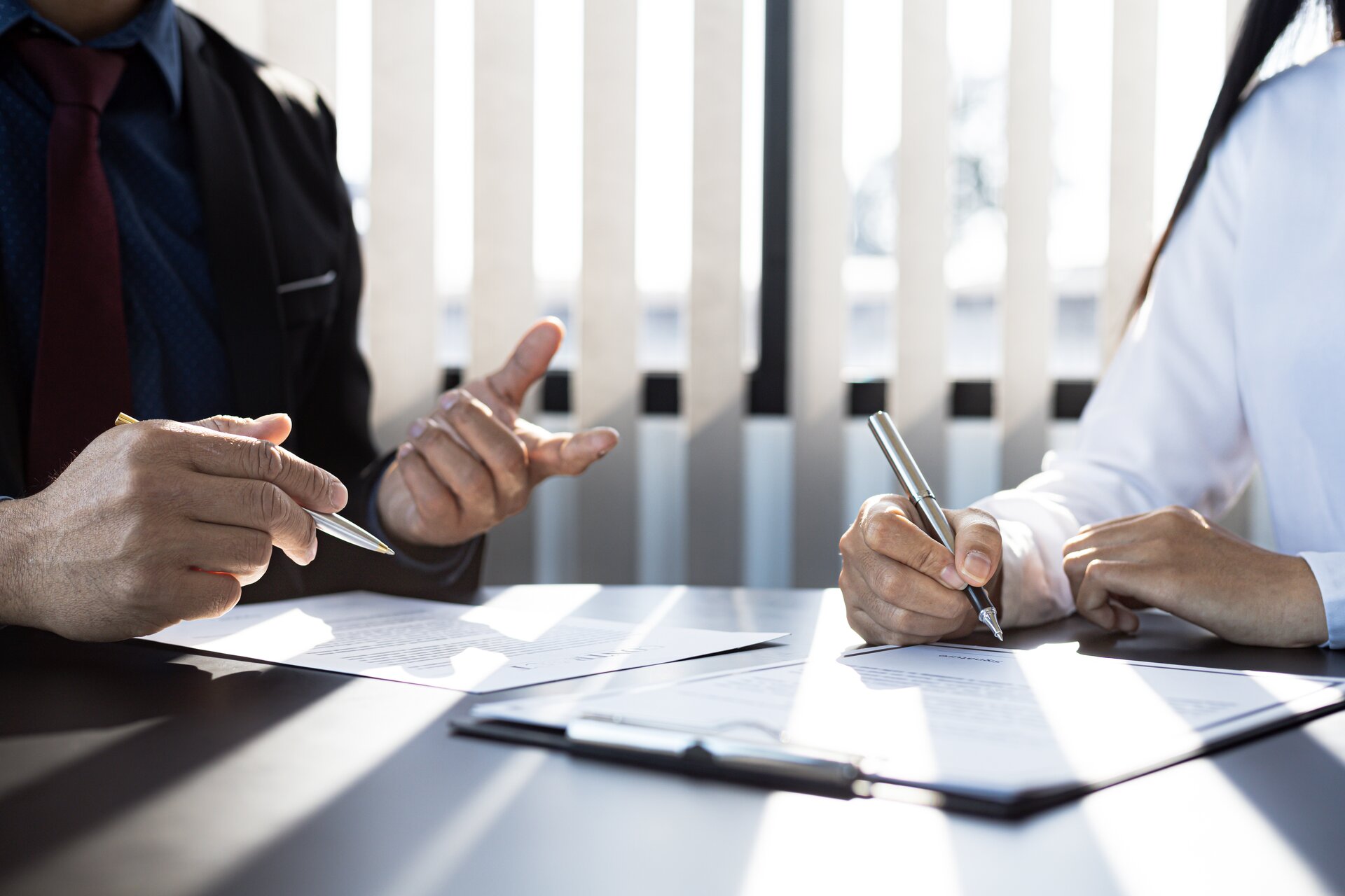 Auto hail damage insurance claim paperwork — Dentic Denver handles the entire claim